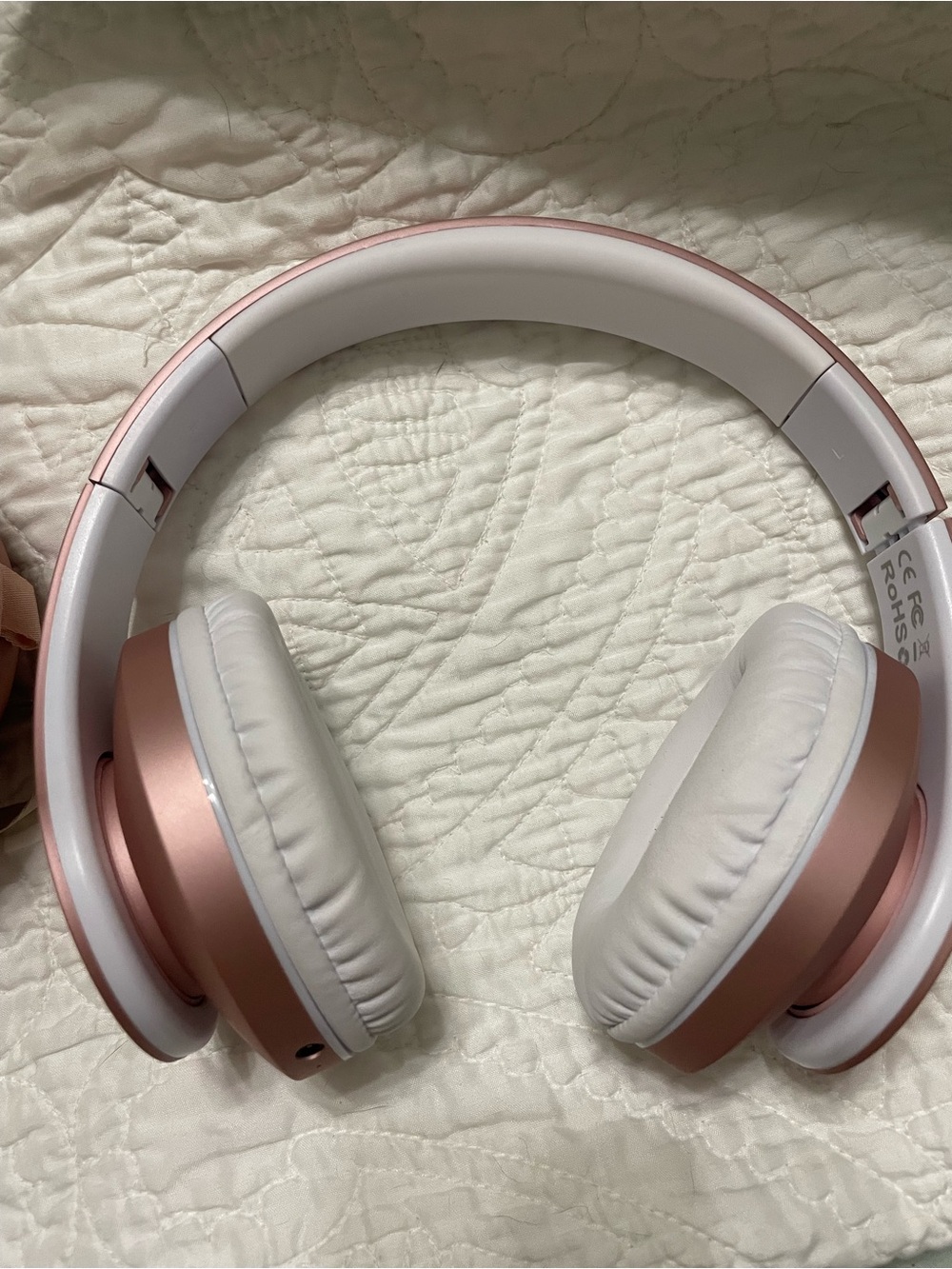 Wireless Over-Ear Headphones in Rose Gold and White